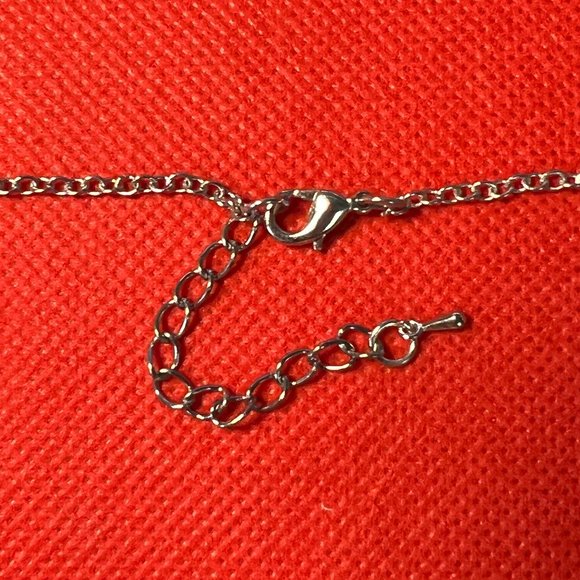 Footprint and Pawprint in the Sand Round Silver Tone Pendant Necklace - Picture 5 of 5